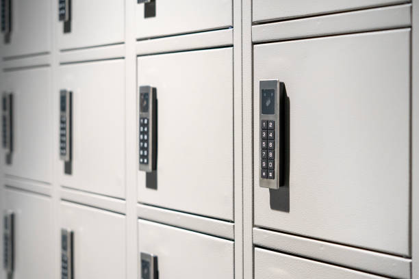 istock A row of closed gray cabinets equipped with a combination lock 2140899377