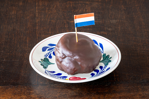 Delicious dutch pastry bossche bol decorated with dutch flag