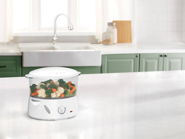 Vegetable steamer on a counter top in a kitchen