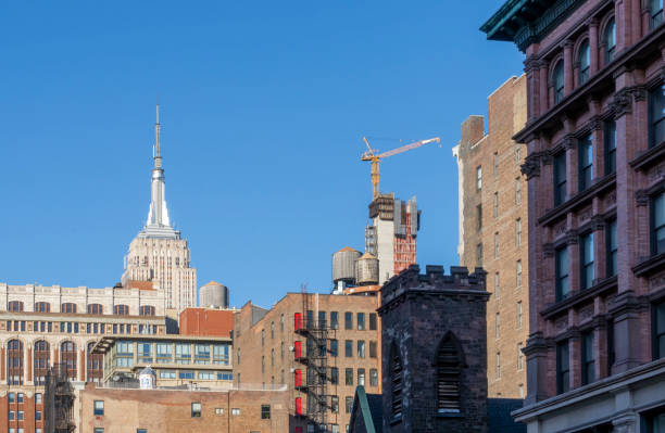 istock Buildings in front of the Empire State building 2140934986