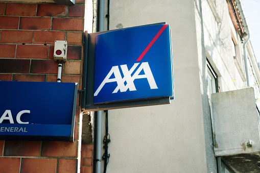 Castelnaudary, France - 28 March, 2024: Sign at an AXA insurance company's premises in Castelnaudary, France.