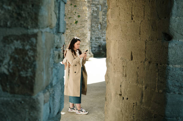 istock Young woman using a smart phone 2140988603
