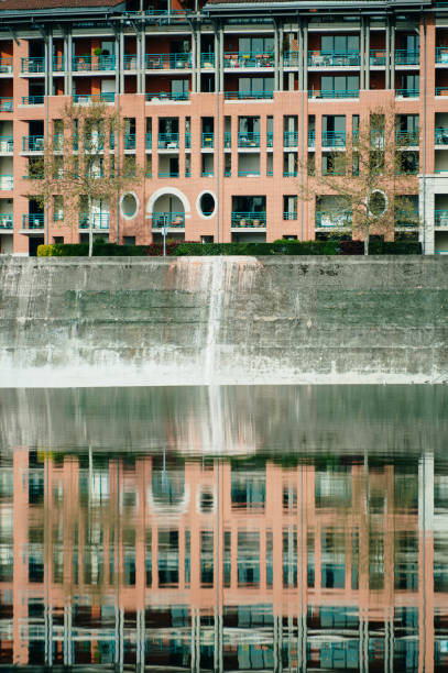 Apartment buildings and reflection on the Garonne river in Toulouse, France