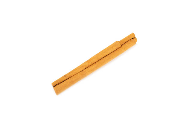 istock Ceylon cinnamon.Cinnamon sticks isolated on white background. Cinnamon roll and powder. Spicy spice for baking, desserts and drinks. Fragrant ground cinnamon. Close-up. Place for text. copy space 2141011398