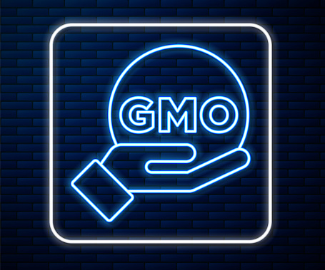 Glowing neon line GMO icon isolated on brick wall background. Genetically modified organism acronym. Dna food modification. Vector.