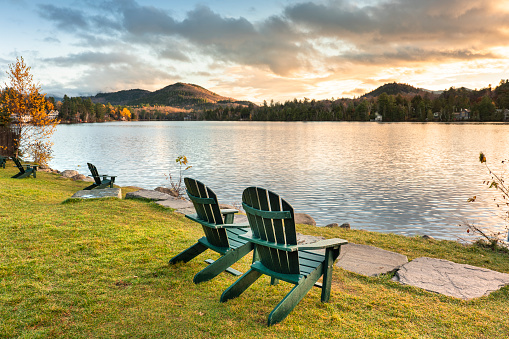 Lake Placid village reflects over Mirror Lake in the Adirondack Mountains of New York State