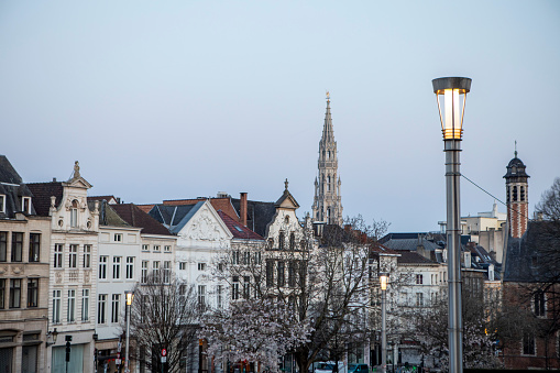 Brussels city skyline at dawn. The Hotel de Ville can be seen on the horizon.