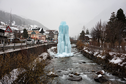 Ice sculpture in winter, a frozen fountain
