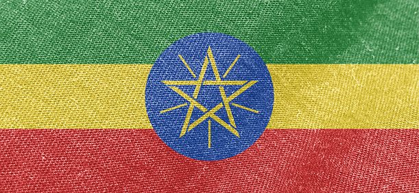 Ethiopia flag fabric cotton material wide flag wallpaper, Textured national flag of Ethiopia for graphic and web design purposes.