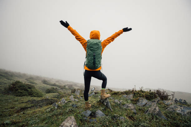 istock Hiking woman on high altitude mountain top 2141124728
