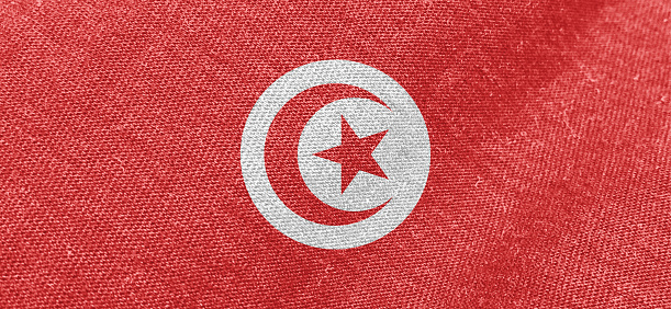 Tunisia flag fabric cotton material wide flag wallpaper, Textured national flag of Tunisia for graphic and web design purposes.