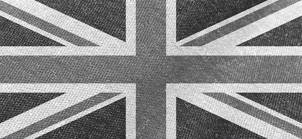 United Kingdom flag fabric cotton material wide flag wallpaper, Textured national flag of United Kingdom for graphic and web design purposes.