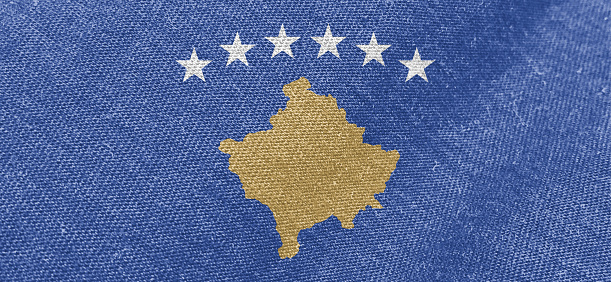 Kosovo flag fabric cotton material wide flag wallpaper, Textured national flag of Kosovo for graphic and web design purposes.