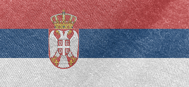 Serbia flag fabric cotton material wide flag wallpaper, Textured national flag of Serbia for graphic and web design purposes.