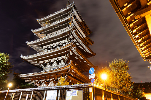 Kyoto, Japan - October 9, 2023: The Yasaka Pagoda and Sannen Zaka Street with no people in the street, Gion district in Kyoto, Japan at night.