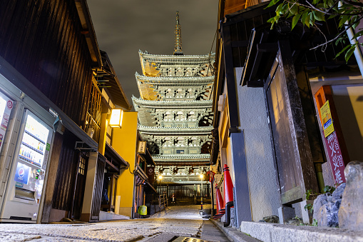 Kyoto, Japan - October 9, 2023: The Yasaka Pagoda and Sannen Zaka Street with no people in the street, Gion district in Kyoto, Japan at night.