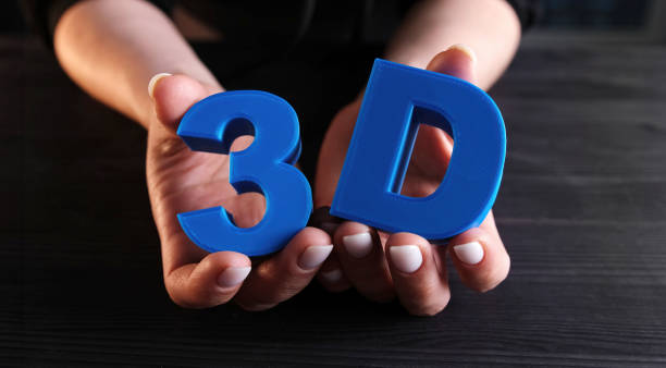 istock Girl Showing Three-Dimensional Letters Printed With 3D Printer 2141182115