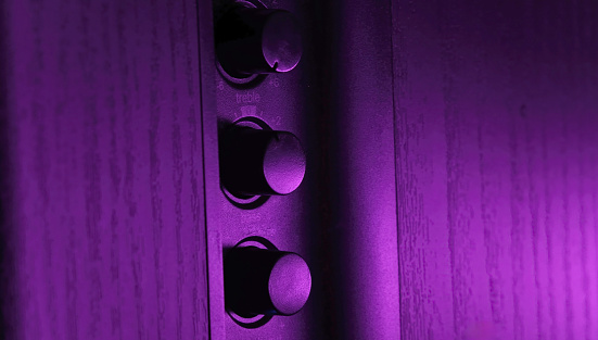 Purple-Lit Music Speaker's Volume And Tone Controls