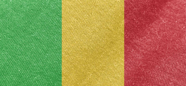 Mali flag fabric cotton material wide flag wallpaper, Textured national flag of Mali for graphic and web design purposes.