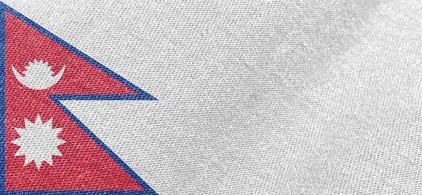 Nepal flag fabric cotton material wide flag wallpaper, Textured national flag of Nepal for graphic and web design purposes.