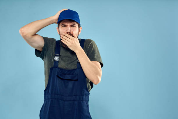 istock Man in working uniform emotions in life delivery service work 2141234929