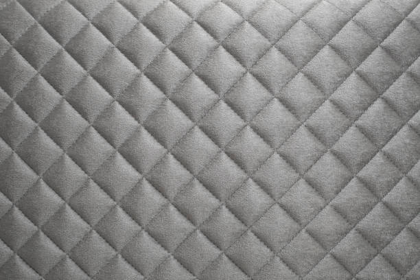 istock diamond shape pattern on a velvet gray sofa, soft focus close up, abstract texture 2141256895