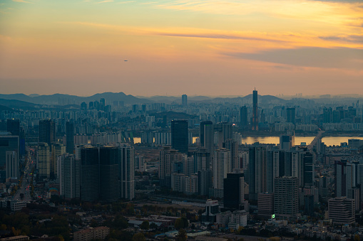 Aerial view of the capital city of Seoul in South Korea, seen at sunset.