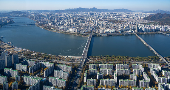 Aerial view overlooking the capital city of Seoul in South Korea and the Han River.