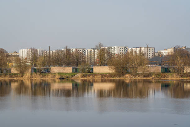 Riga, Latvia - April 1, 2024: Soviet-era architecture, residential houses in Kengarags district. Car garages in the foreground