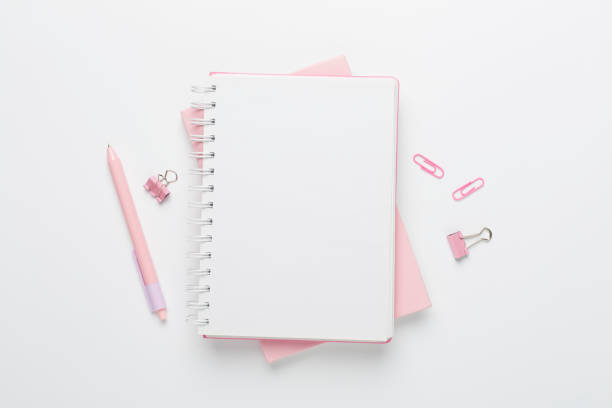 istock Notebooks with stationery on color background, top view 2141504904