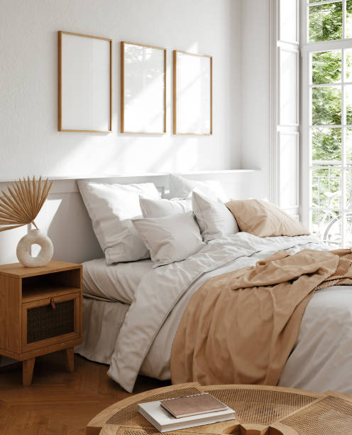 istock Mockup frame in light cozy and simple bedroom interior background 2141541034