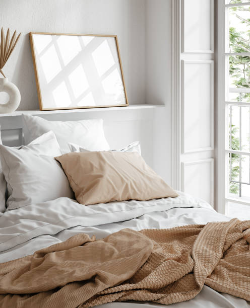 istock Mockup frame in light cozy and simple bedroom interior background 2141541046