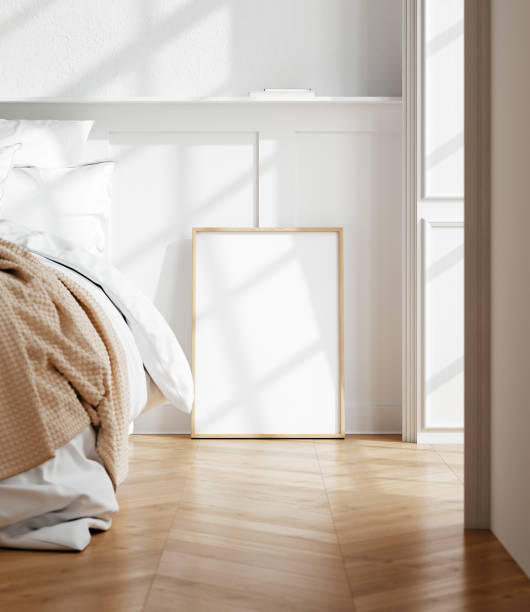 istock Mockup frame in light cozy and simple bedroom interior background 2141541047