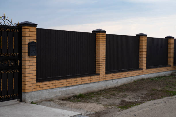 istock Metal Fence with brick columns 2141685302