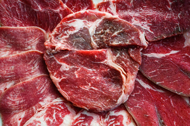 istock close up Raw beef fillet steaks with herbs and spices 2141706253