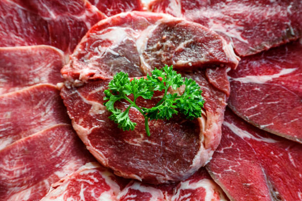 istock close up Raw beef fillet steaks with herbs and spices 2141707367