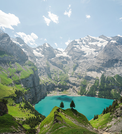 Scenic view of pristine Oeschinensee lake  in Swiss Alps in summer