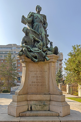 Craiova, Romania - March 16, 2024: Bronze Statue of Barbu Dimitrie Stirbei at Prefecture Park Spring Day.