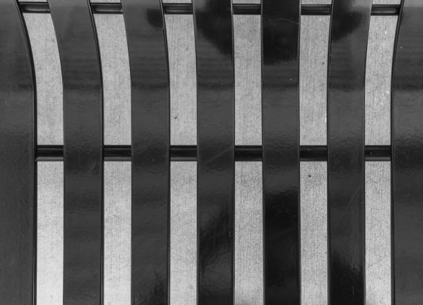 Close up of contemporary modern stainless steel street or park bench