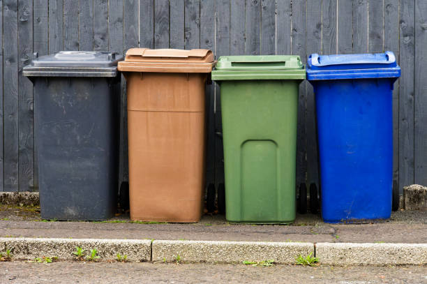 istock Wheelie bins in row segregated for recycling rubbish 2141798079