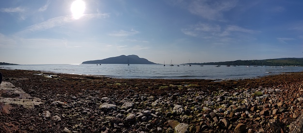 View of Holy Isle in Lamlash Bay from beach at Lamlash, Isle of Arran, Glasgow, Scotland