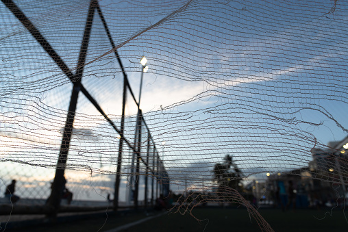 Salvador, Bahia, Brazil - December 19, 2021: View of the net of the Rio Vermelho sports court in the city of Salvador, Bahia.