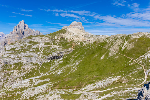 Amazing panoramic view from Seceda park on Dolomites Alps, Odle - Geisler mountain group, Secede peak and Seiser Alm (Alpe Siusi). Selva di val gardena, Trentino Alto Adige, South Tyrol, Italy, Europe