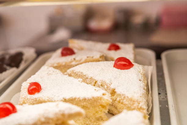 istock Cherry Topped Triangle Vanilla Cakes Retail Display 2141844939