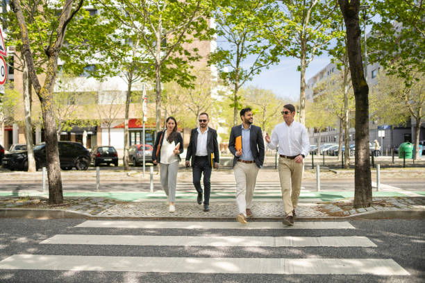istock Business people walking at the crosswalk 2141852920