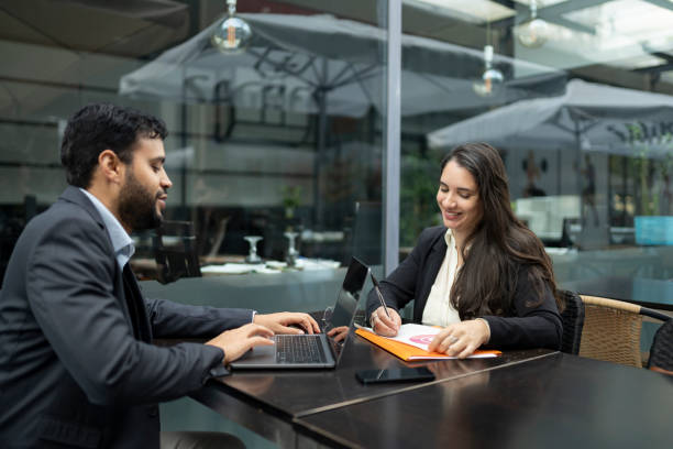 istock Coworkers working in the cafe 2141855029