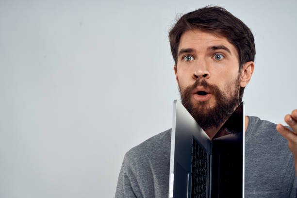 istock man with laptop technology entertainment communication official 2141859847