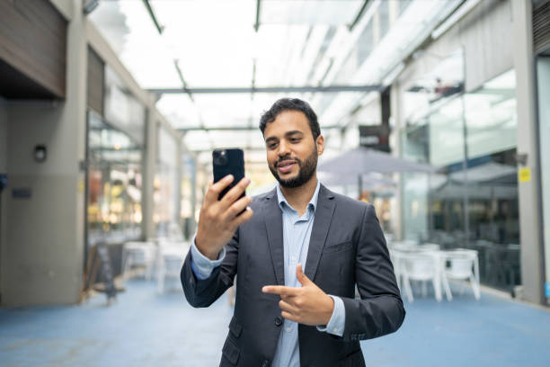 istock Businessman making video call at company 2141862477