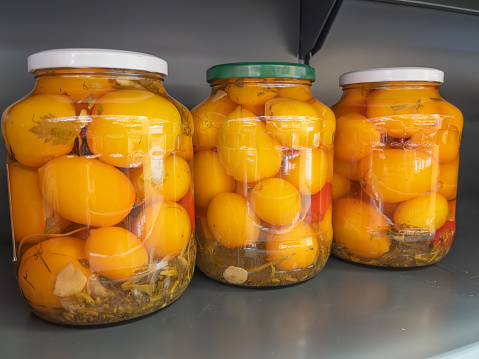 Canned Peaches on Shelf