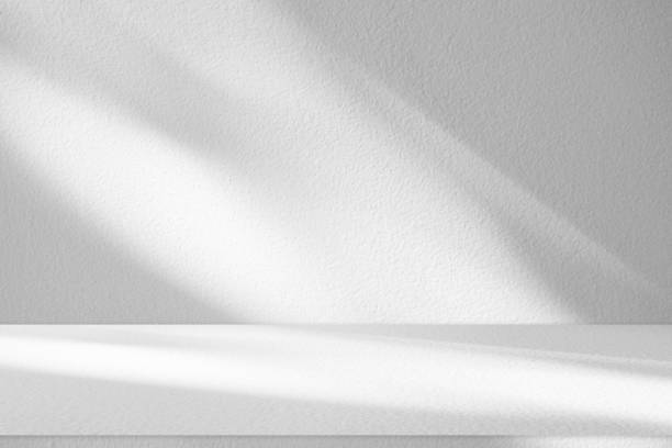 istock Wall interior background, studio and backdrops show products.with shadow from window color white . background for text insertion and presentation product 2142110096